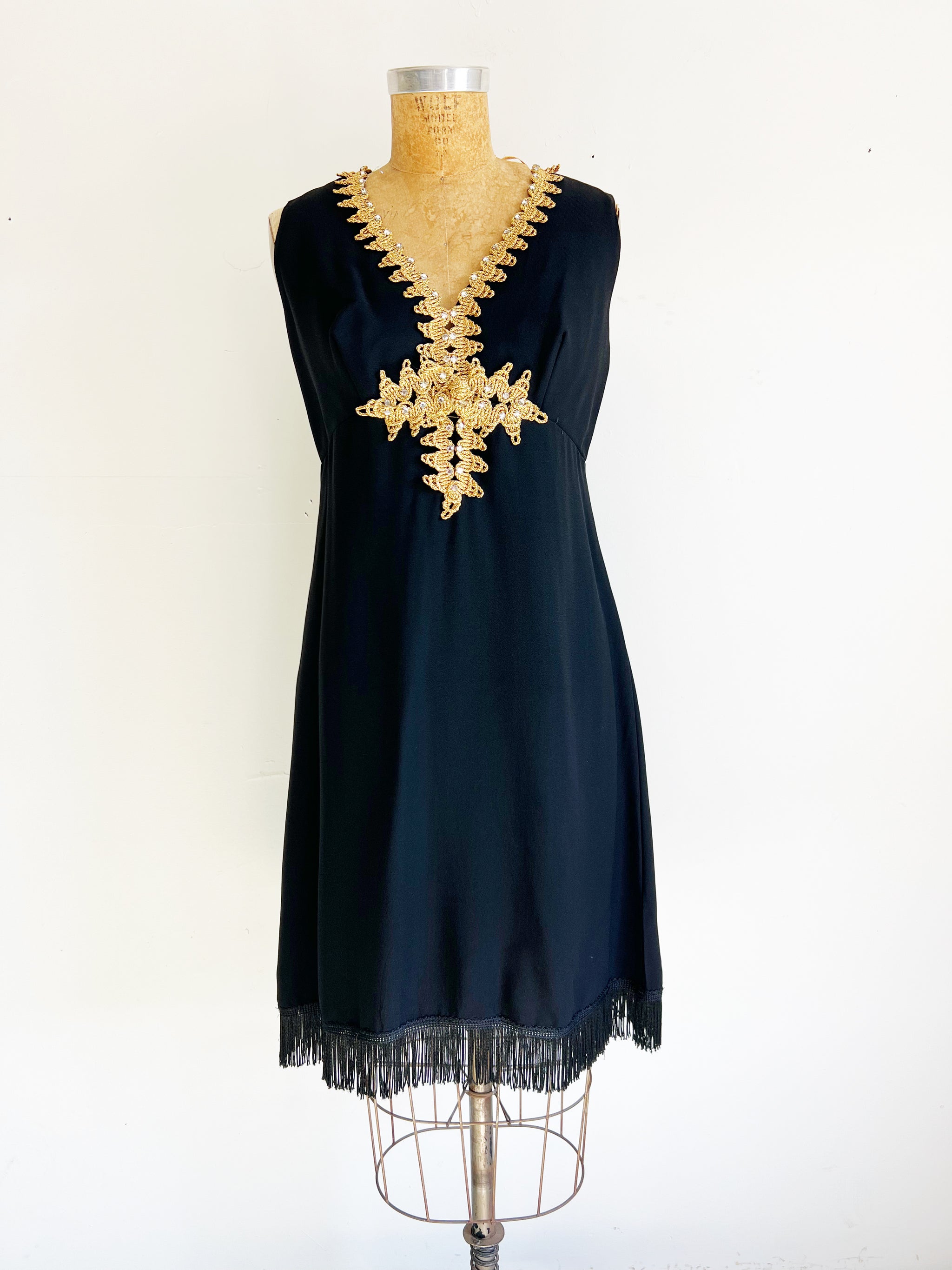 1960s Vintage Black Crepe Cocktail Dress with Gold Braid and Fringe / Medium